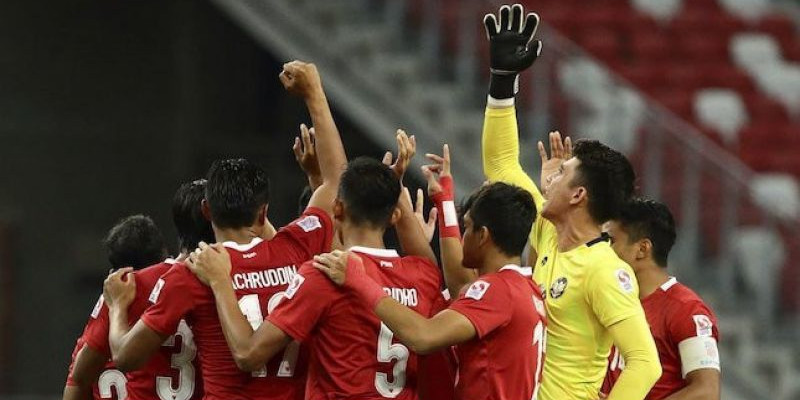 Timnas Indonesia dalam laga leg 1 final Piala AFF 2020 menghadapi tim Thailand di National Stadium, Singapura (29/12/2021) malam WIB/ Foto: AP Photo