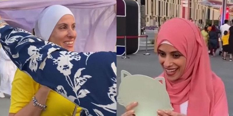 Turis mencoba menggunakan hijab dalam social eksperimen yang dilakukan relawan Qatar/Net