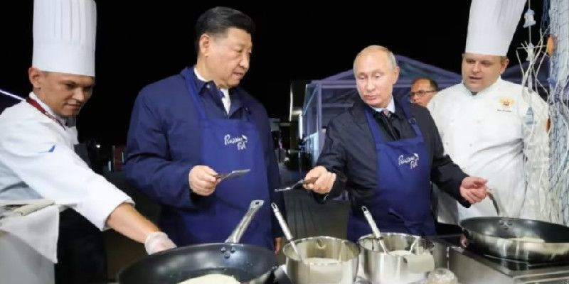Pertemuan informal Xi Jinping & Putin/ AFP