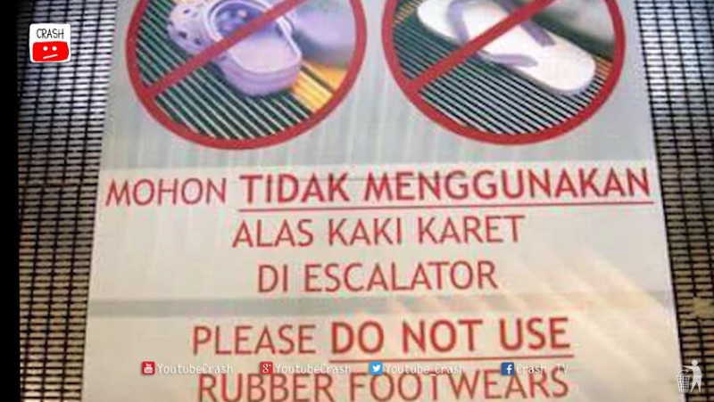 Peringatan penggunaan alas kaki karet saat naik eskalator/Net