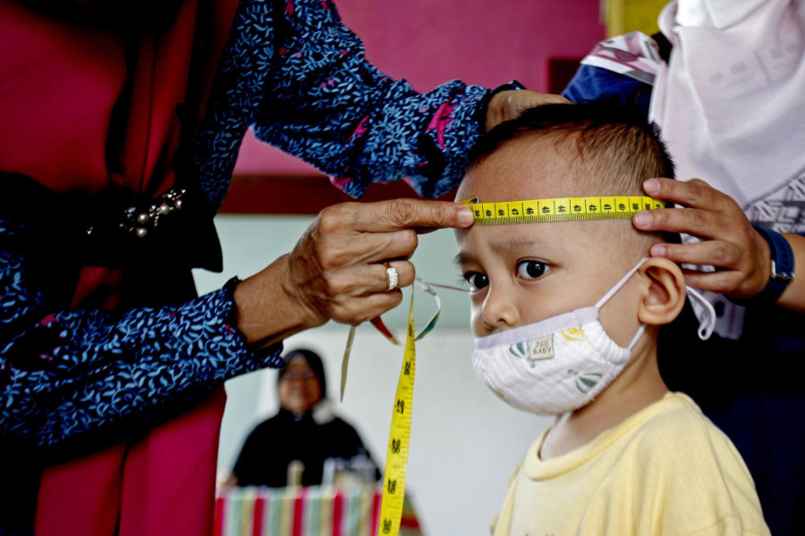 Mengukur tumbuh kembang anak di posyandu penting dilakukan untuk mengetahui apakah anak mengalami stunting atau tidak/Net